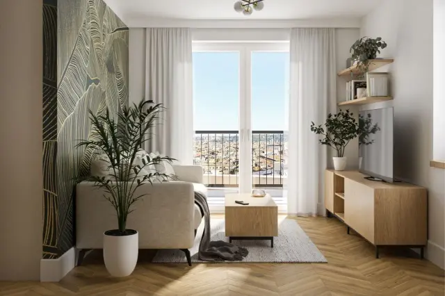 Nowoczesny salon w bloku: jasna sofa, drewniane meble, efektowna tapeta i duży balkon z widokiem.